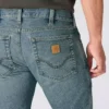 Calças de ganga de trabalho masculinas com corte «bootcut» descontraído e tecido «Rugged Flex»