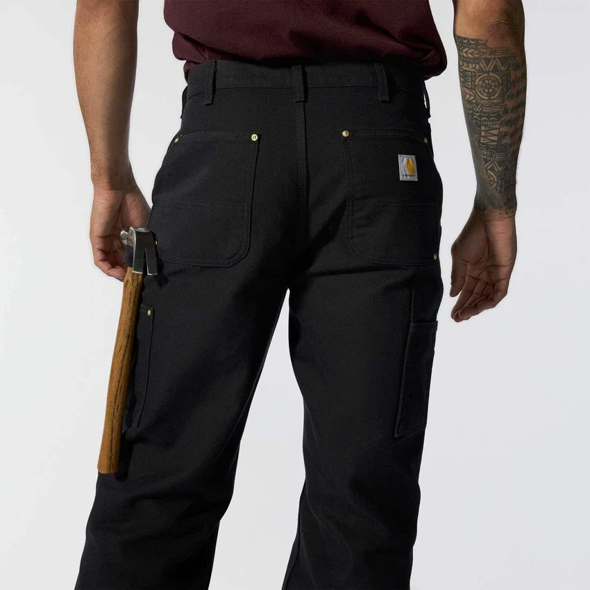 Calças de trabalho carhartt B01 para homem, com corte largo icónico, em tecido «Firm Duck» e joelhos duplos