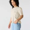 Camisas de gola redonda, corte largo e leve, com bolso, em Tencel
