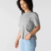 Camisas de gola redonda, corte largo e leve, com bolso, em Tencel