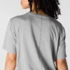 Camisas de gola redonda, corte largo e leve, com bolso, em Tencel