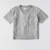 Camisas de gola redonda, corte largo e leve, com bolso, em Tencel