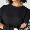 Camisas femininas Dearborn de corte largo, com manguitos compridos e peso pesado, com logótipo