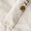 Camisas femininas Dearborn de corte largo, com manguitos compridos e peso pesado, com logótipo