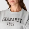 Camisola feminina de corte largo e peso médio com gola redonda e estampado carhartt 1889
