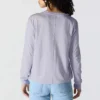 T-shirt feminina de manguitos longos com gola redonda e bolso, em Tencel