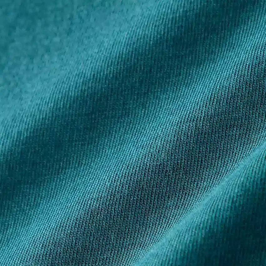T-shirt feminina de manguitos longos com gola redonda e bolso, em Tencel